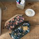 Trousse de toilette motif feuilles